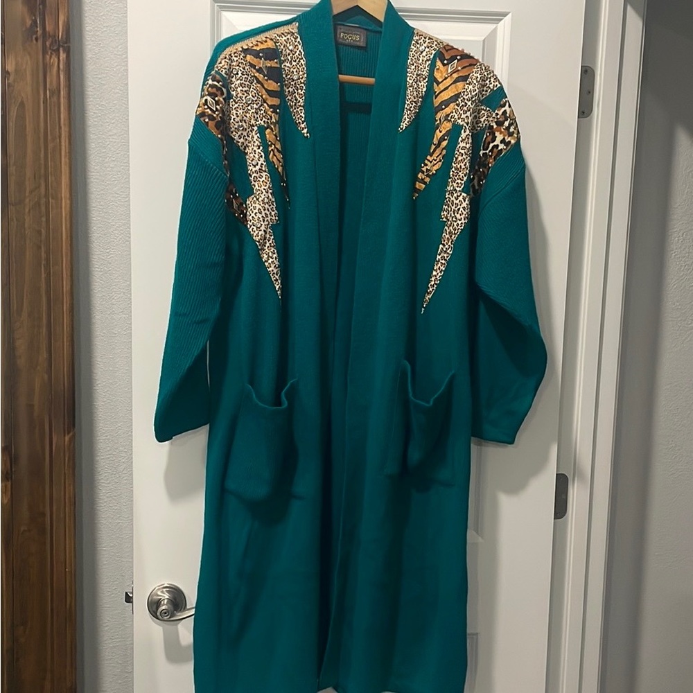 Teal cardigan with leopard detail on shoulders